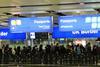 Air travelers queue at border control at Heathrow Airport. Passengers from the EU face uncertainty as the UK government is poised to trigger article 50 to initiate brexit, March 14, 2017.