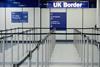An image showing a room with the UK border sign visible