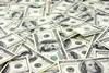 A picture showing lots of US dollar bills