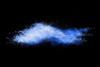 An image of a powder with a faint blue glow