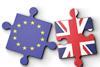 Some jigsaw pieces with the EU flag and the union flag on them