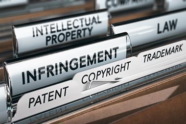 Illustration of a folder, focus on a tab with the word infringement.