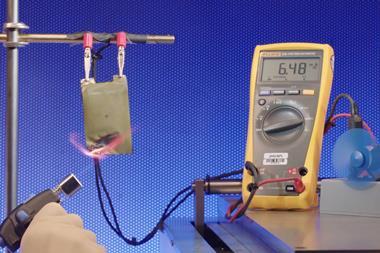 Image depicting a battery being set on fire