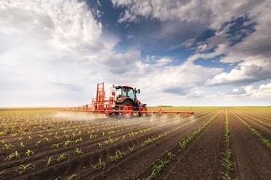 Spraying pesticide
