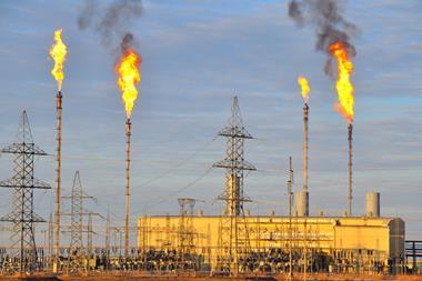 A photograph of flares at a refinery