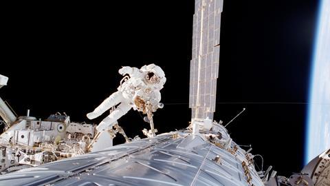 Astronaut Robert L. Curbeam, mission specialist, participates in the second of three STS-98 sessions of extravehicular activity