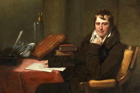 An oil painting of Sir Humphrey Davy, a well-dressed Regency gentleman at his desk